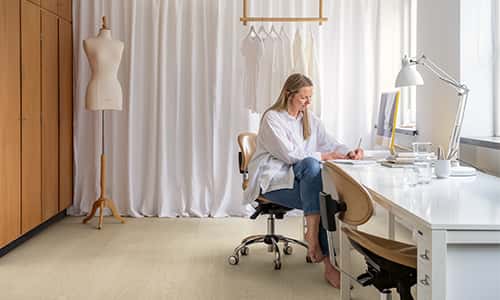 home office with a beige vinyl floor